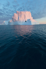 Huge icebergs of different forms in the Disko Bay, West Greenland. Their source is by the...