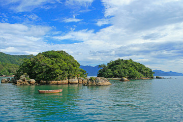 Fototapeta na wymiar Natural reserve tropical islands at Ilha Grande, with forests and calm ocean waters