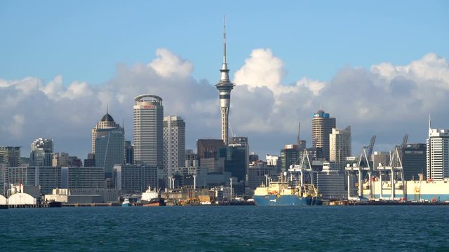 Auckland, New Zealand harbour and city center with Auckland Sky Tower waterfront view from Devonport. Travel attraction in Auckland, New Zealand.