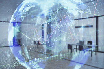 Fototapeta na wymiar Stock and bond market graph and world map with trading desk bank office interior on background. Multi exposure. Concept of international finance
