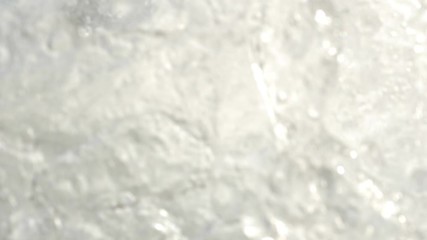 Slow motion sea waves crashing. Close-up shot.