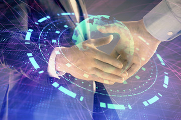 Multi exposure of world map on abstract background with two businessmen handshake. Concept of international business