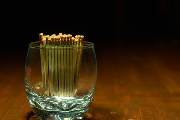 Toothpicks in glass 