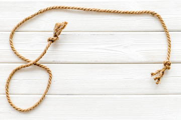 rope frame on white wooden background top view mock up