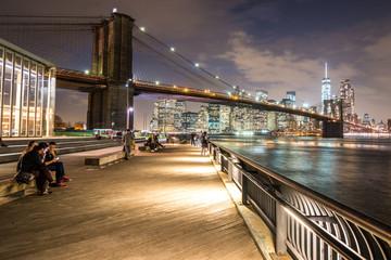 Brooklyn bridge at night with Jane's Carousel, New York