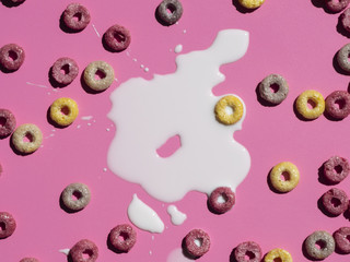 Top view milk and cereals on pink background