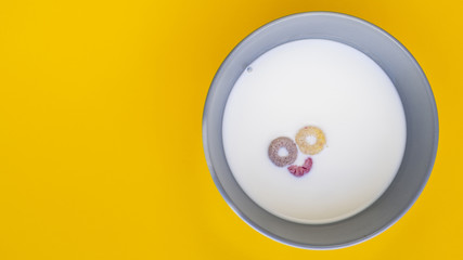 Smiley face in a bowl filled with milk