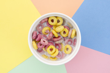 Top view delicious bowl of fruit cereal loops