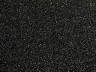 wet asphalt road texture, dark background