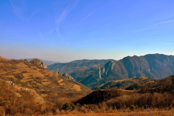silhouettes of mountains in the evening