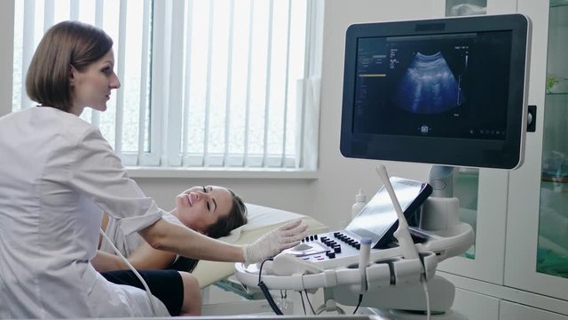 Pregnant woman on utltrasonographic examination at hospital