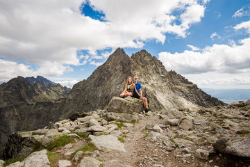 Naklejka premium Tourists below Rysy Tatra mountains