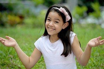 Petite Asian Girl And Indecisiveness - obrazy, fototapety, plakaty