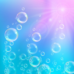 Realistic transparent floating soap bubbles with rainbow reflection. Design element for advertising booklet, flyer or poster