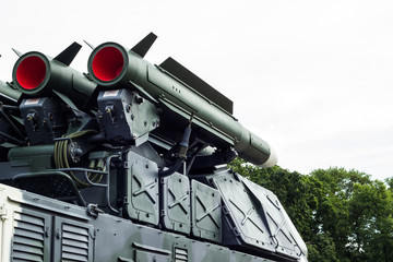 Anti-aircraft missile system. Green army vehicle. Close up view