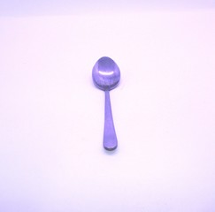 a stainless steel tea spoon