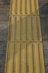 Tactile paving for blind handicap. Closeup view