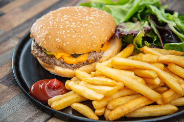 Cheese burger - American cheese burger with Golden French fries