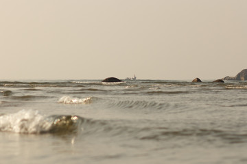 Boat goes to sea. Ocean waves.