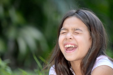 A Laughing Petite Child