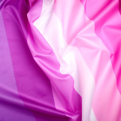 textile pink flag of lesbians, concept of the fight for equal rights
