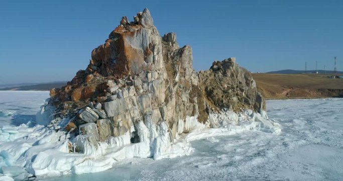 Tranquil Aerial View of the Baikal Bay Shamanka in winter time. Olkhon Island, Baikal, Russia, Siberia. Drone footage