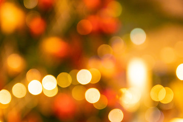 Unfocused Bokeh colorful of Christmas sparkle red and green composition background holiday concept