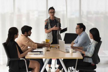 Composite image of team marketing meeting