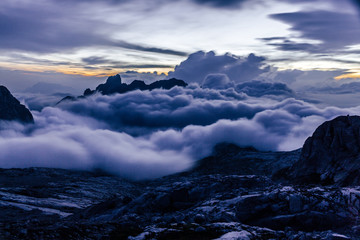 Stunning sunset over mountain alpine landscape and high summits or peak of Gosaukamm ridge,...
