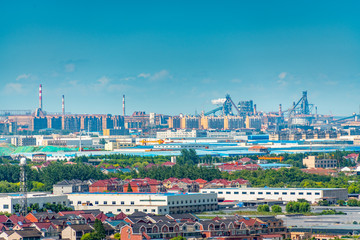 Industrial factories and nearby homes in Shanghai, China