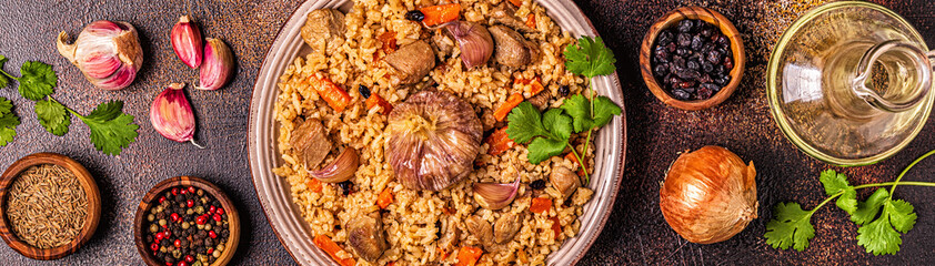 Pilaf with meat, vegetables and spices.