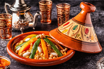 Vegetable tagine with almond and chickpea couscous. - obrazy, fototapety, plakaty