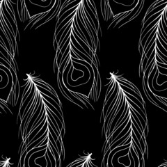 seamless pattern with peacock feathers in black and white