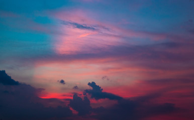 Obraz na płótnie Canvas Sunset Through the Clouds.