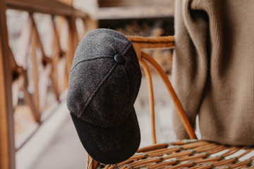 Forage with  peak weighs on  wicker chair
