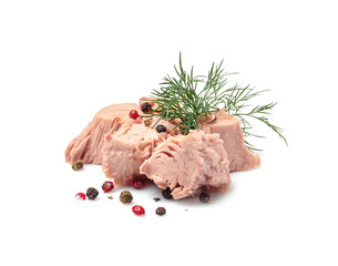 Pieces of canned tuna with dill and pepper on white background