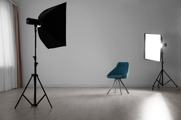 Photo studio interior with set of professional equipment