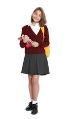 Happy girl in school uniform on white background