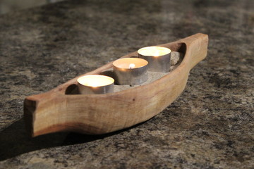 A miniature Mokoro. A Mokoro is a type of canoe, commonly used along the Okavango River. This particular one was purchased from a local community in northern namibia, and used as a table decoration.