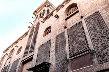 Oriental architecture with traditional Arabic patterns on the windows. Heritage Village, Deira,...