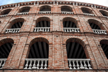 Fototapeta na wymiar Facade of the bullring in Valencia, built in the middle of the 19th century, Spain, Apr. 2019