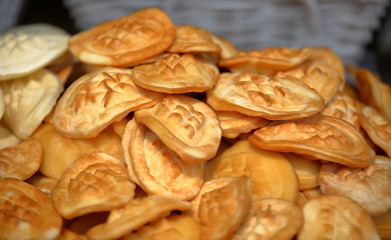 Traditional local sheep cheese from Tatra mountains in Poland, called oscypek, on stack, close up