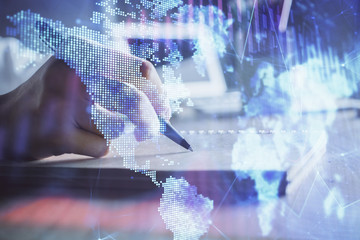 Financial charts displayed on woman's hand taking notes background. Concept of research. Double exposure