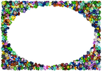 Oval frame made of multi colored gemstones on white background