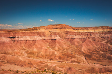 Red rock desert cliff face