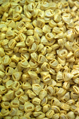Traditional Italian food: uncooked tortellini