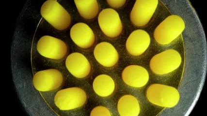 Grinder grinds the abstract paste.