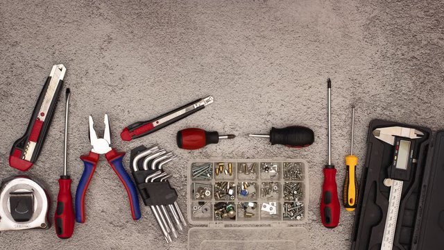 Stop motion animation of construction and diy tools and pliers moving 