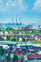 Obraz premium Industrial factories and nearby homes in Shanghai, China
