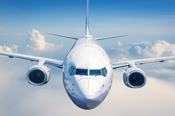 modern airliner over the clouds